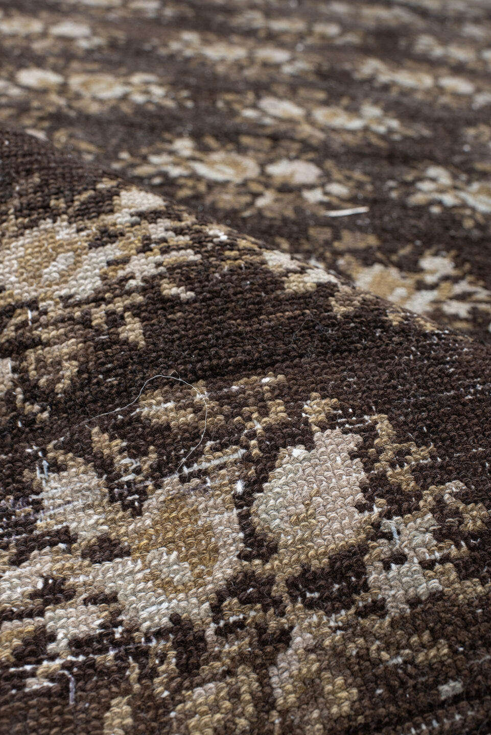 4' x 7' one-of-a-kind handmade vintage  rug. Color palette: brown, ivory, taupe, camel, charcoal, gold, rust, beige, gray