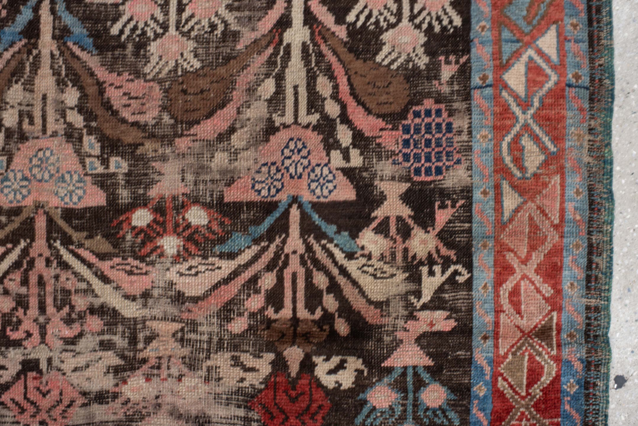 4' x 8' one-of-a-kind handmade vintage Karabagh rug. Color palette: charcoal, rust, ivory, turquoise, rose, taupe, navy