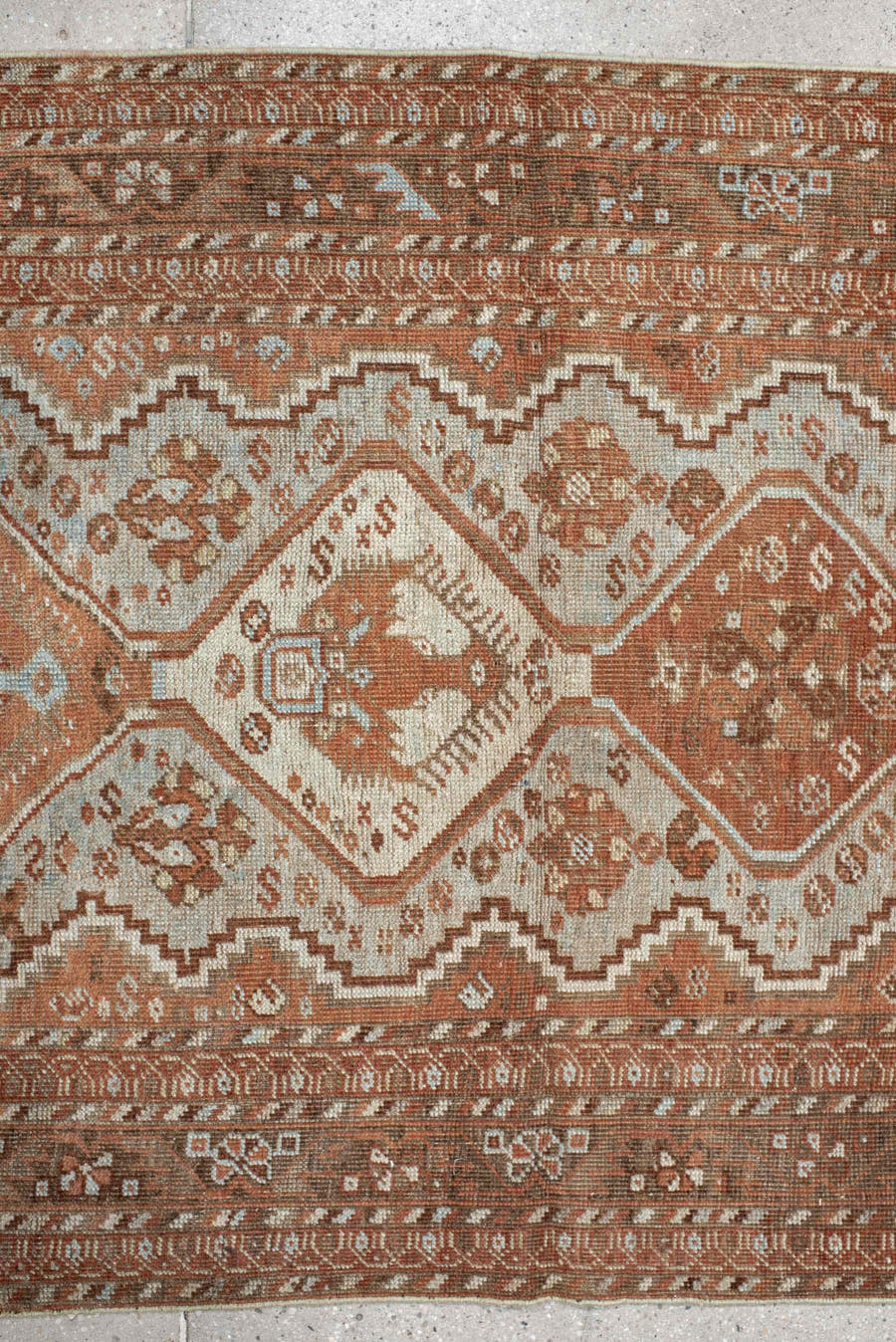 3' x 12' one-of-a-kind handmade vintage Shiraz runner rug. Color palette: ivory, rust, camel, taupe, pale blue, brown