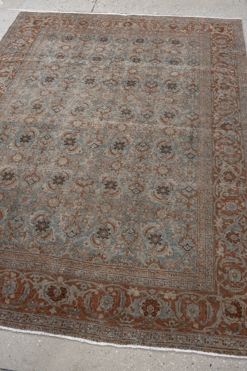 4' x 5' one-of-a-kind handmade vintage Tabriz small size rug. Color palette: light blue, rust, ivory, taupe, brown, charcoal