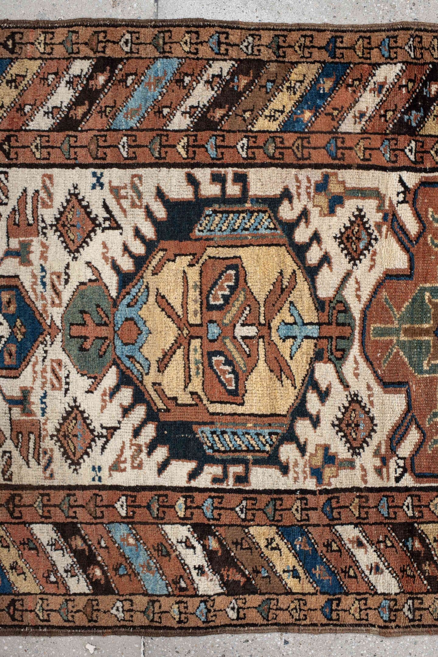 3' x 12' one-of-a-kind handmade vintage NW Persian runner rug. Color palette: ivory, rust, camel, blue, brown, teal, taupe
