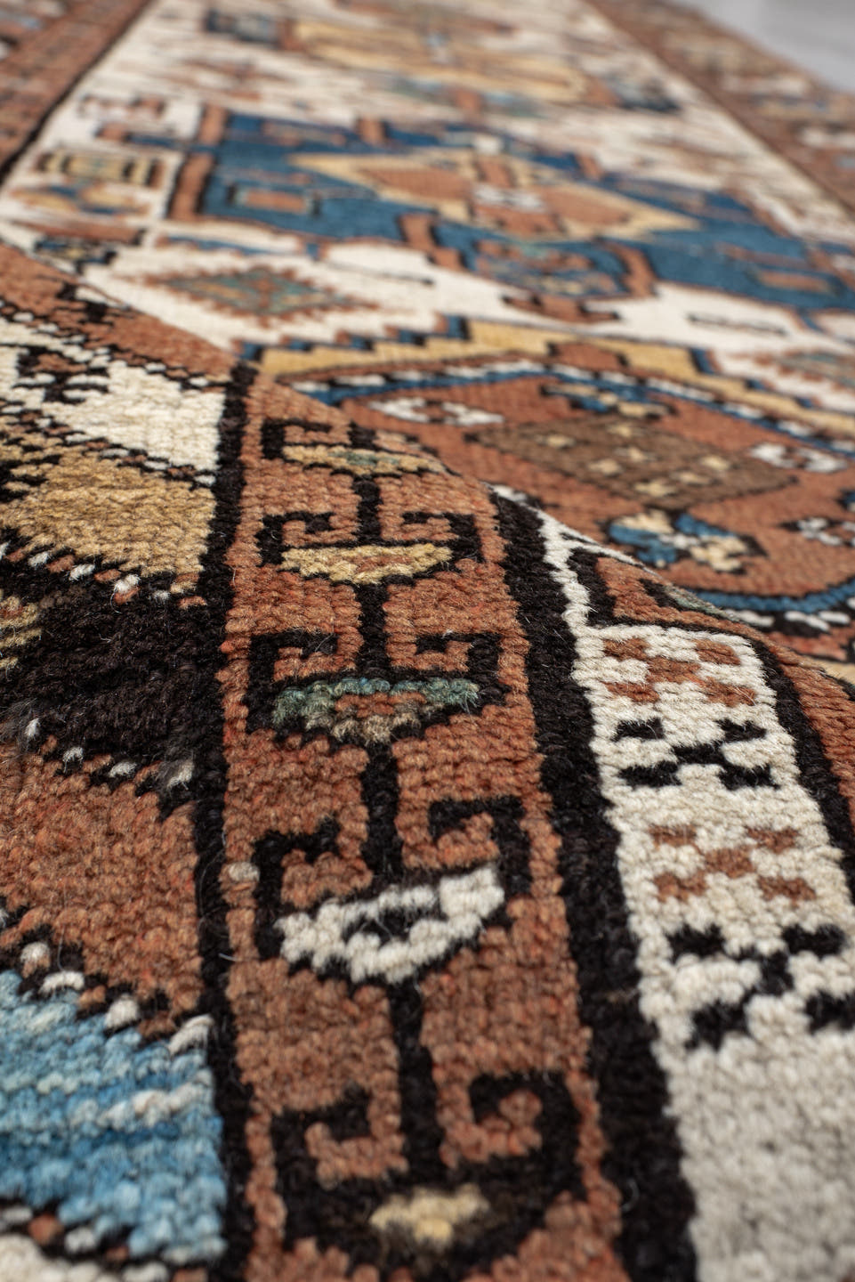 3' x 12' one-of-a-kind handmade vintage NW Persian runner rug. Color palette: ivory, rust, camel, blue, brown, teal, taupe