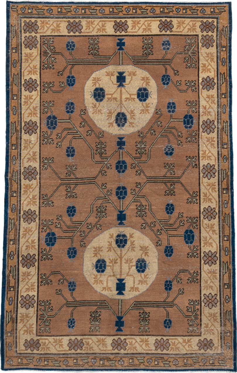 4' x 6' one-of-a-kind handmade vintage Khotan small size rug. Color palette: camel, ivory, indigo, taupe, brown, slate