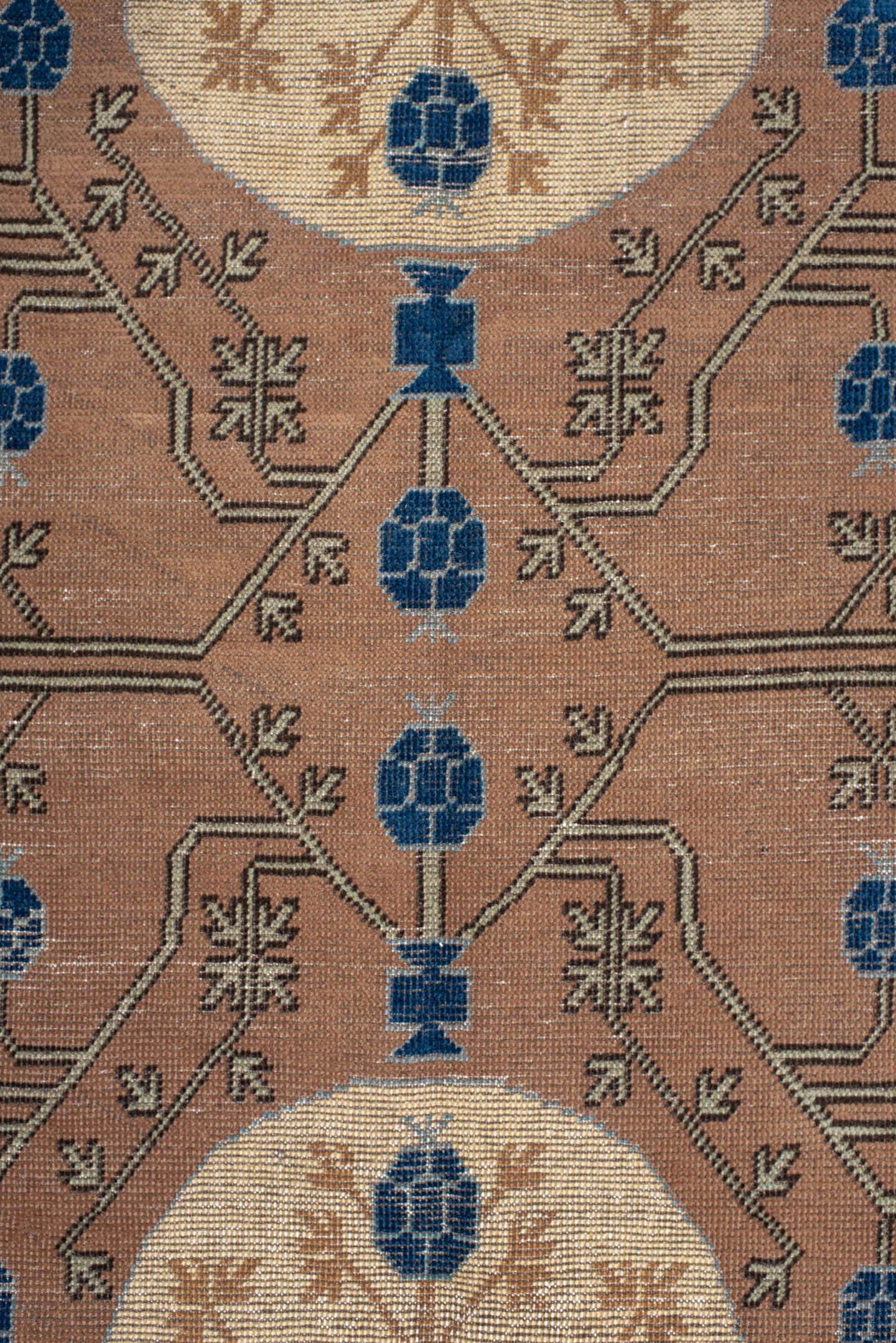 4' x 6' one-of-a-kind handmade vintage Khotan small size rug. Color palette: camel, ivory, indigo, taupe, brown, slate
