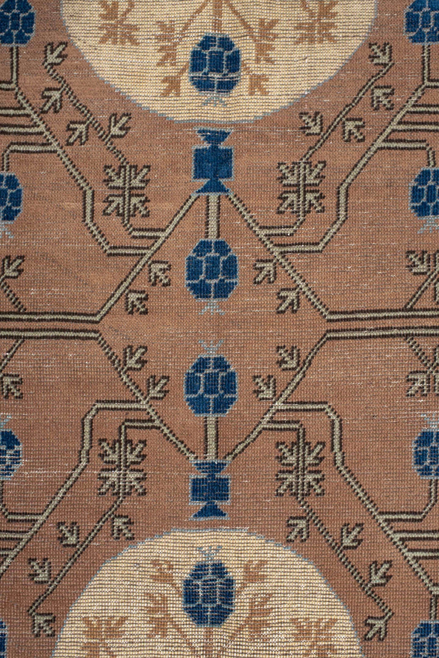 4' x 6' one-of-a-kind handmade vintage Khotan small size rug. Color palette: camel, ivory, indigo, taupe, brown, slate