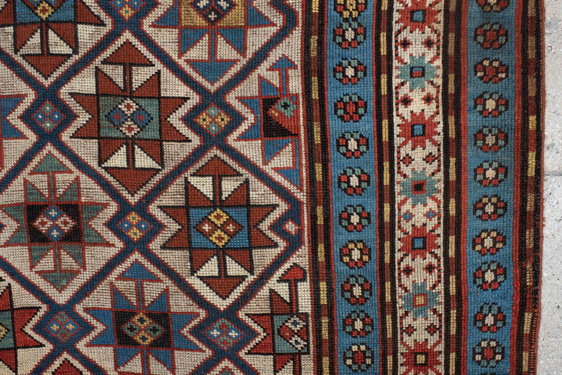 3' x 6' one-of-a-kind handmade vintage Kazak small size rug. Color palette: antiquewhite, arapawa, bisque, black