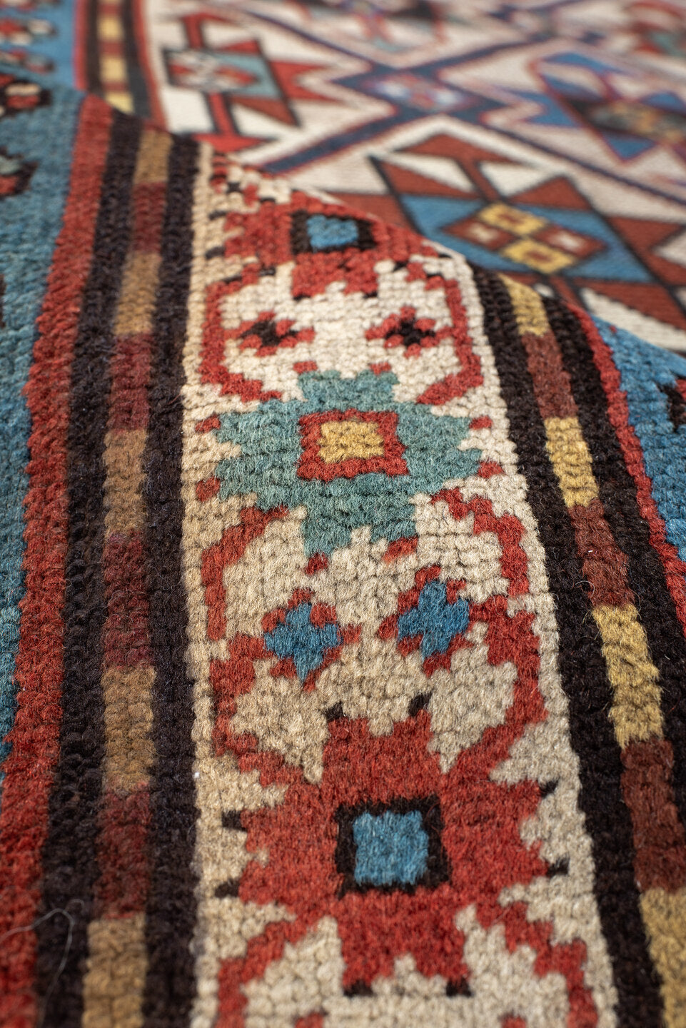 3' x 6' one-of-a-kind handmade vintage Kazak small size rug. Color palette: antiquewhite, arapawa, bisque, black