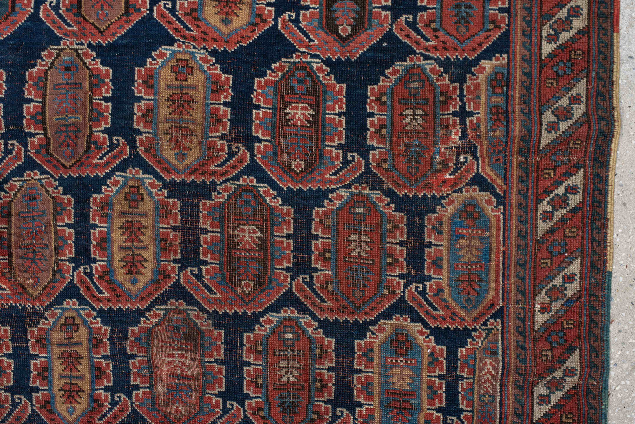4' x 7' one-of-a-kind handmade vintage Afshar rug. Color palette: navy, rust, ivory, sky_blue, camel, slate, terracotta