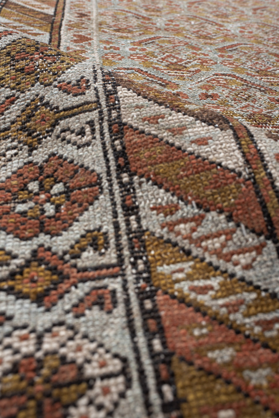 3' x 10' one-of-a-kind handmade vintage Malayer runner rug. Color palette: taupe, rust, ivory, muted blue, camel, brown