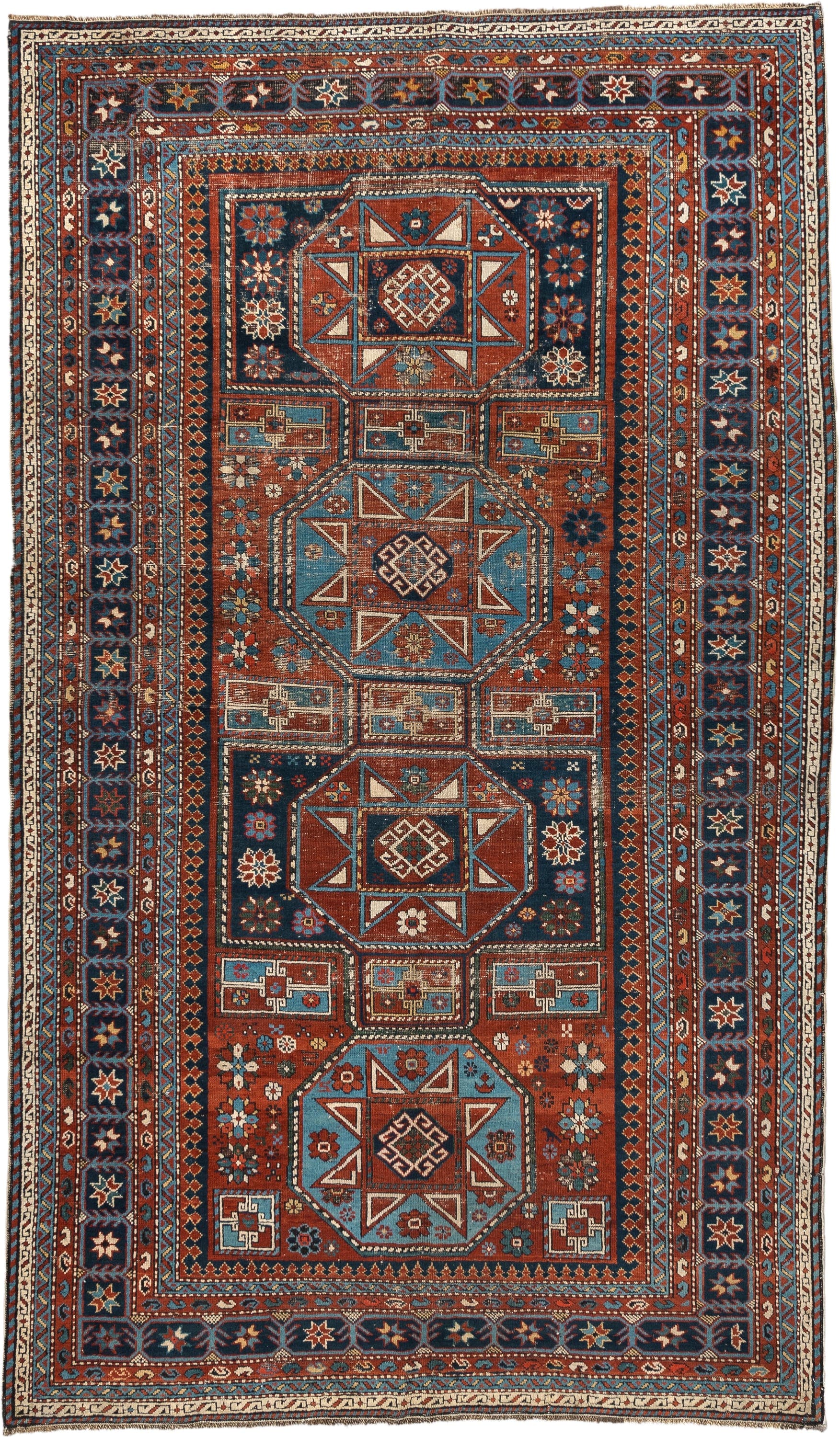 4' x 8' one-of-a-kind handmade vintage Shirvan rug. Color palette: rust, navy, sky blue, ivory, terra cotta, slate, cream