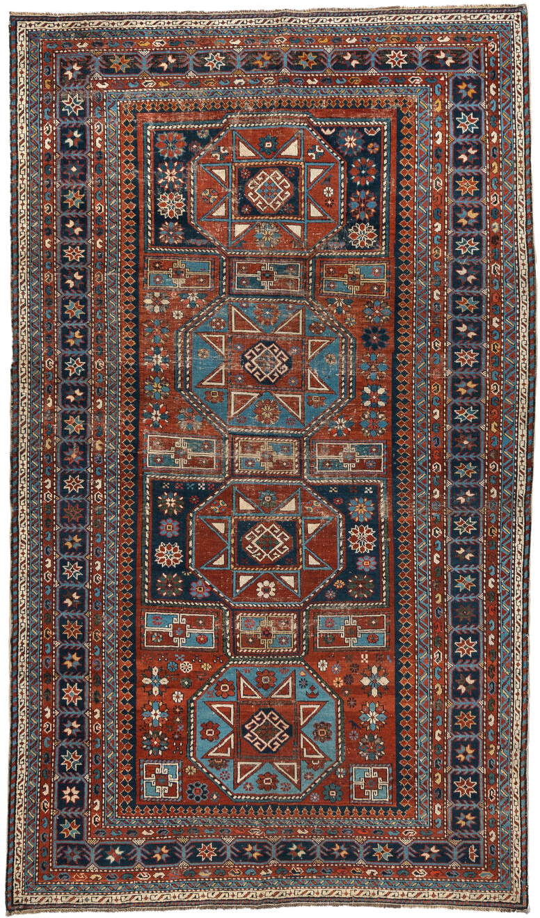 4' x 8' one-of-a-kind handmade vintage Shirvan rug. Color palette: rust, navy, sky blue, ivory, terra cotta, slate, cream