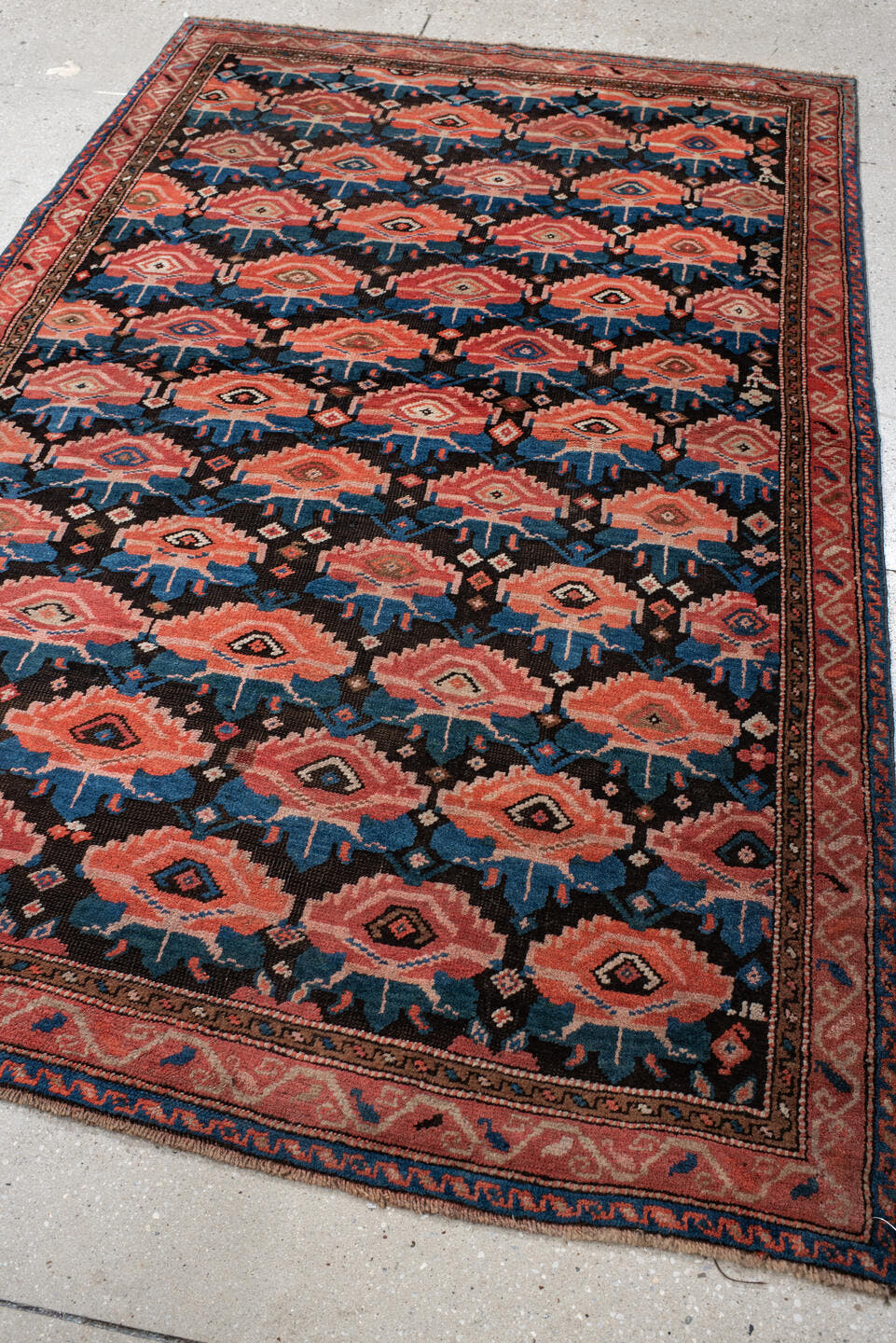 4' x 6' one-of-a-kind handmade vintage Caucasian small size rug. Color palette: rust, charcoal, teal, coral, ivory, navy