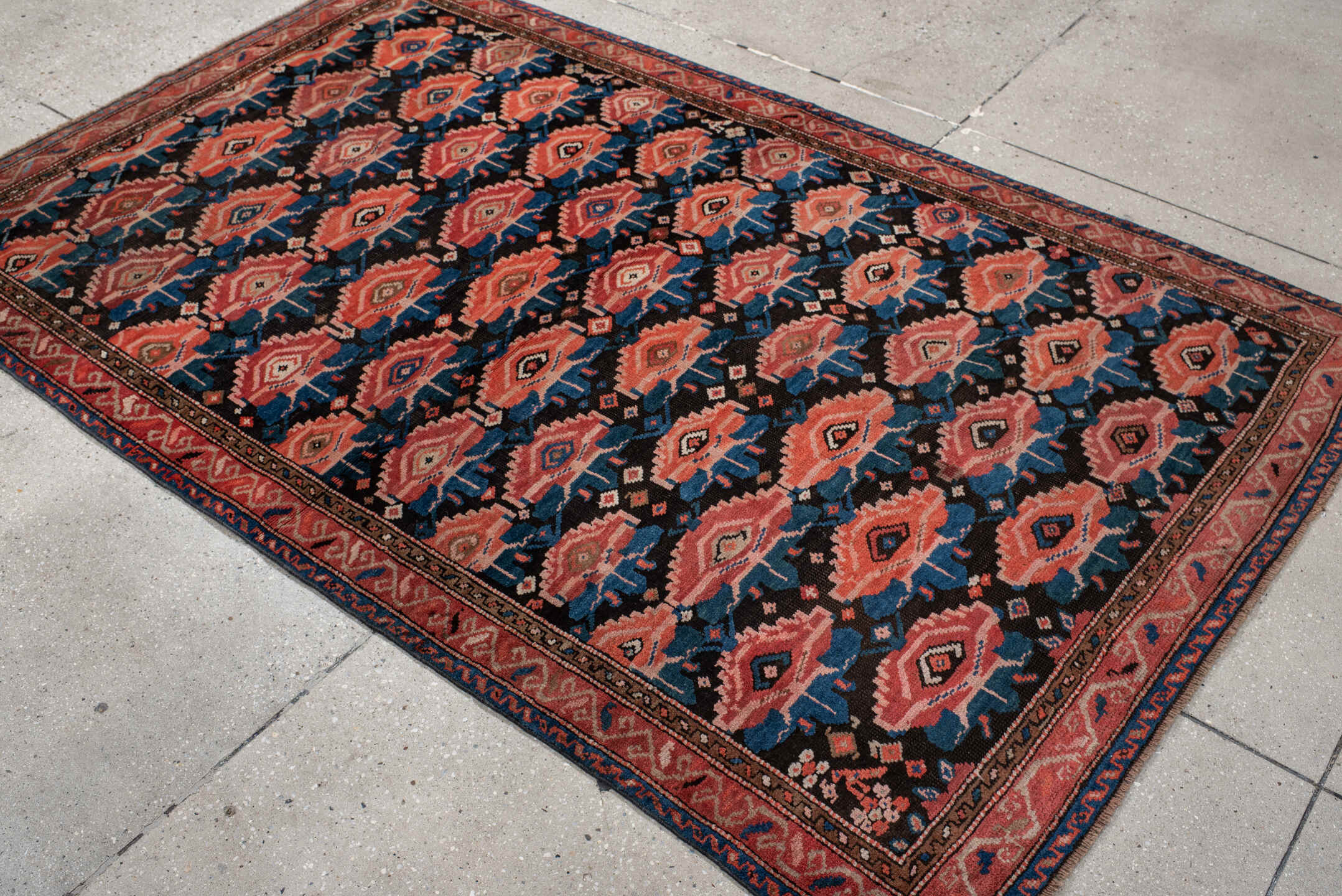 4' x 6' one-of-a-kind handmade vintage Caucasian small size rug. Color palette: rust, charcoal, teal, coral, ivory, navy