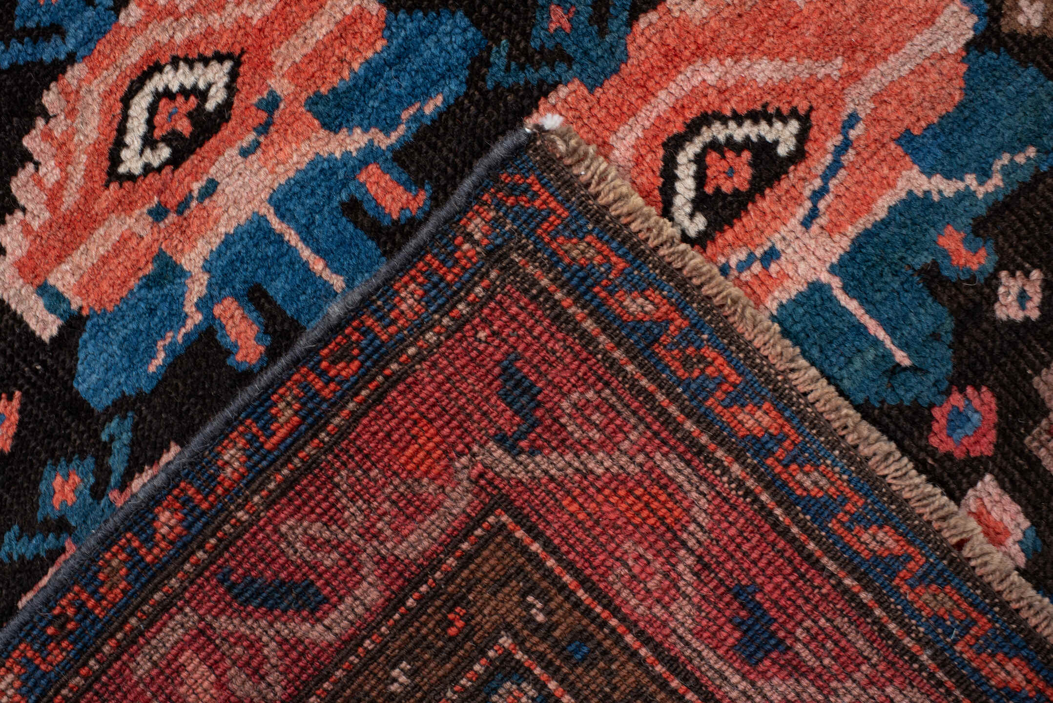 4' x 6' one-of-a-kind handmade vintage Caucasian small size rug. Color palette: rust, charcoal, teal, coral, ivory, navy