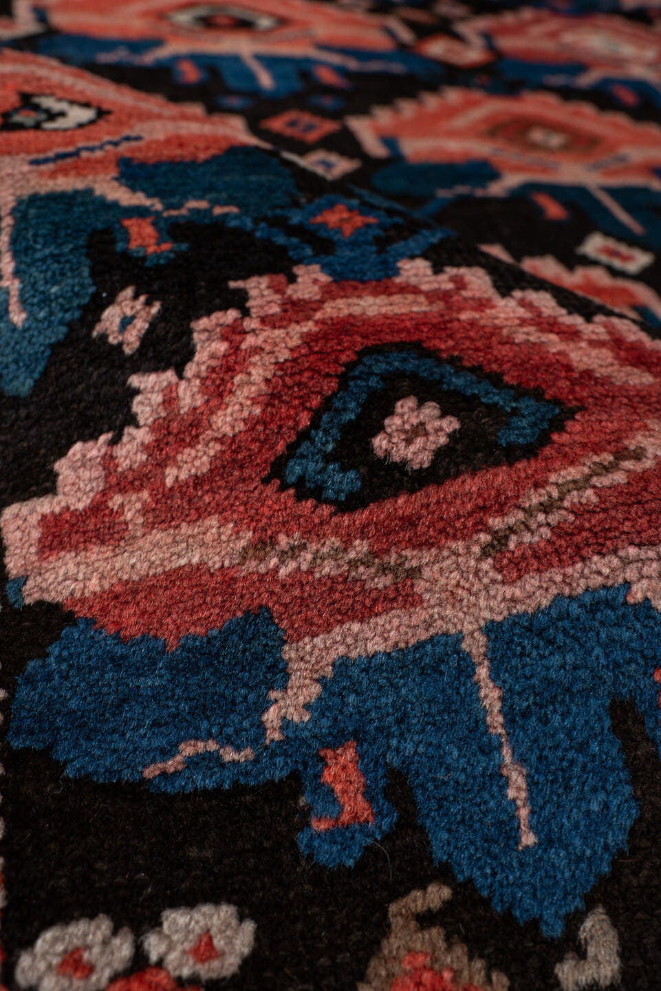 4' x 6' one-of-a-kind handmade vintage Caucasian small size rug. Color palette: rust, charcoal, teal, coral, ivory, navy