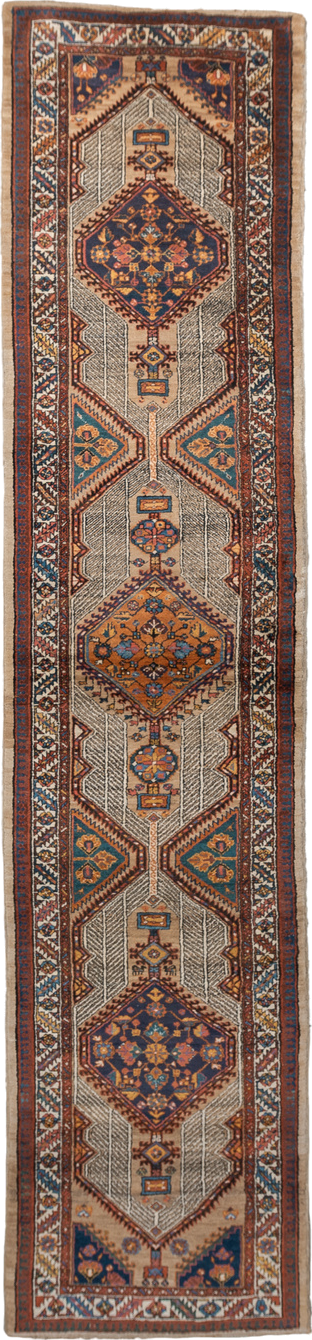 3' x 15' one-of-a-kind handmade vintage Sarab runner rug. Color palette: ivory, rust, indigo, camel, navy, terra cotta