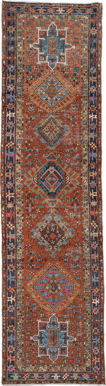 3' x 11' one-of-a-kind handmade vintage Karaje runner rug. Color palette: rust, indigo, sky_blue, ivory, camel, slate, rose