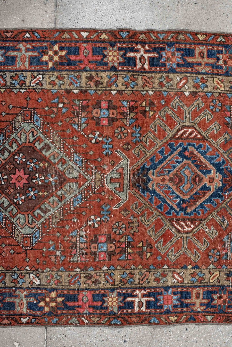 3' x 11' one-of-a-kind handmade vintage Karaje runner rug. Color palette: rust, indigo, sky_blue, ivory, camel, slate, rose