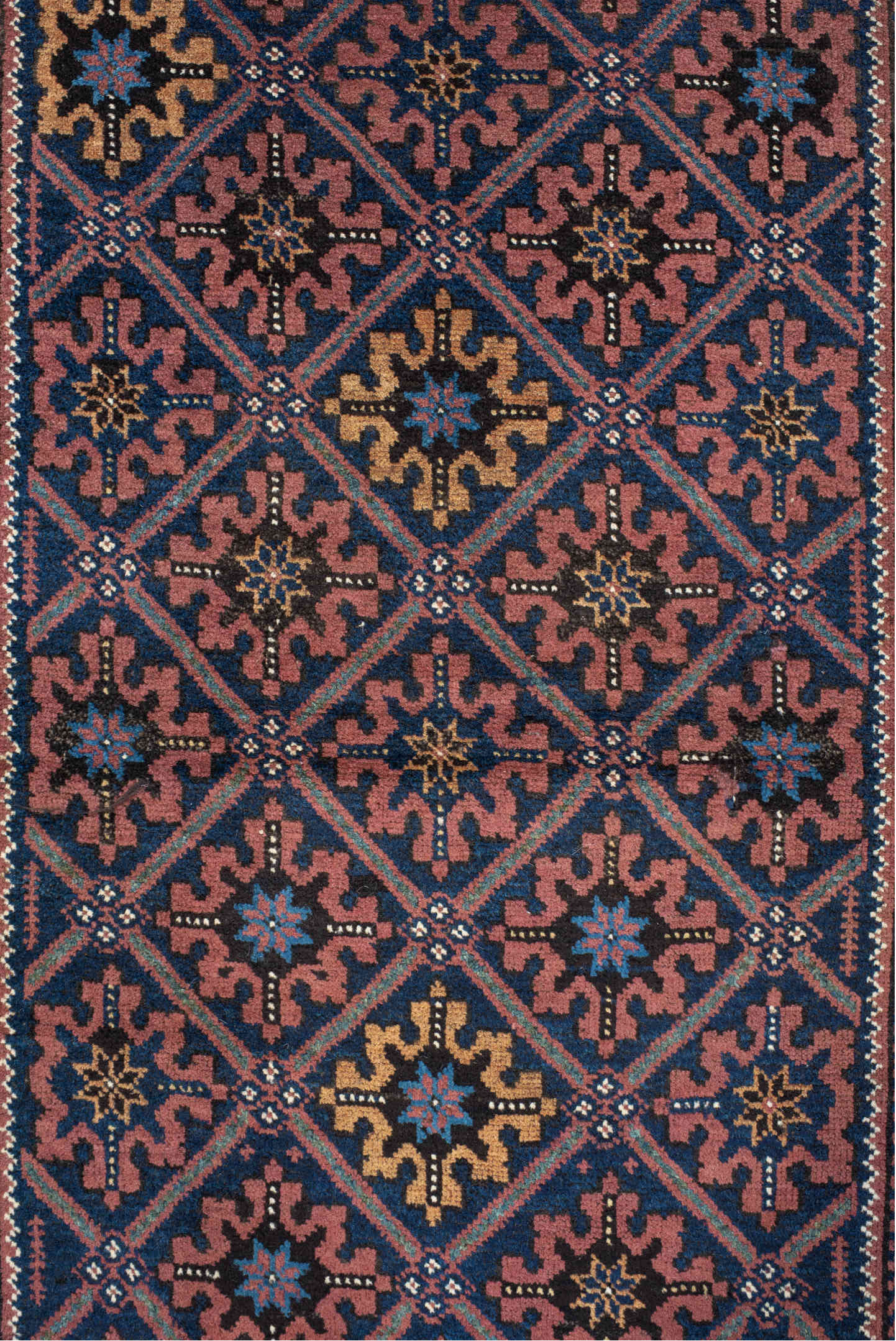 2' x 4' one-of-a-kind handmade vintage Belouch small size rug. Color palette: black, blue, brown, burlywood, charcoal