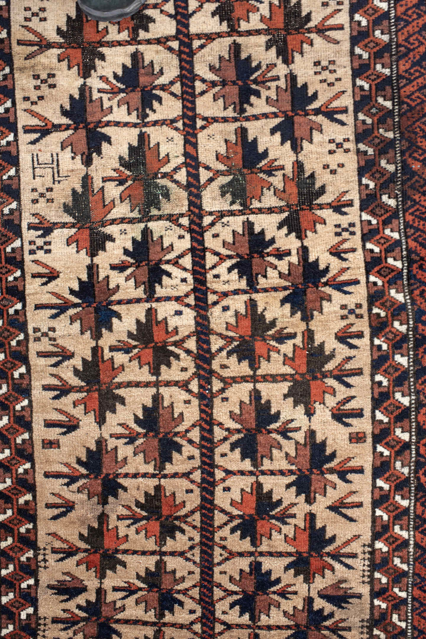 2' x 4' one-of-a-kind handmade vintage Belouch small size rug. Color palette: ivory, rust, navy, camel, brown, terracotta