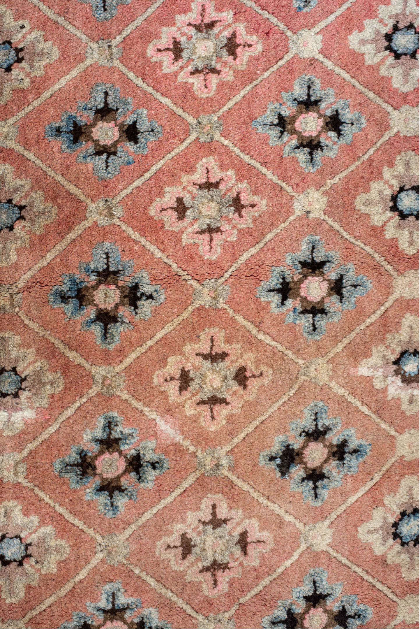 4' x 7' one-of-a-kind handmade vintage Tibetan rug. Color palette: salmon, charcoal, sky blue, ivory, rose, taupe, brown