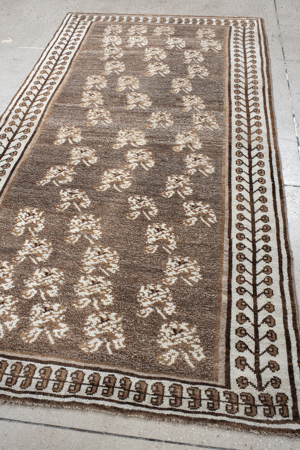 4' x 7' one-of-a-kind handmade vintage Gabbe rug. Color palette: brown, ivory, taupe, camel, beige, gray