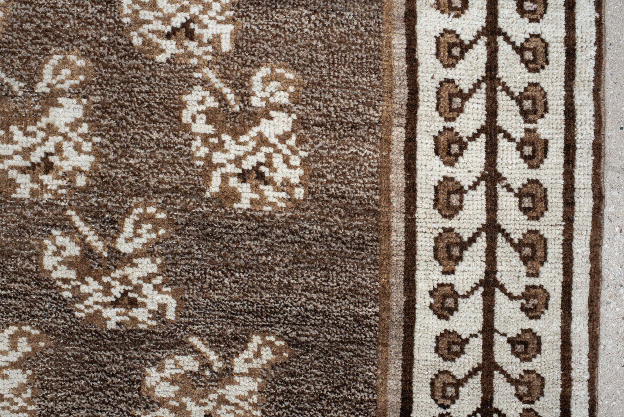 4' x 7' one-of-a-kind handmade vintage Gabbe rug. Color palette: brown, gray, light gray, off-white, orange, pink, silver
