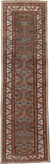 3' x 10' one-of-a-kind handmade vintage NW Persian runner rug. Color palette: camel, rust, ivory, indigo, terra cotta, brown