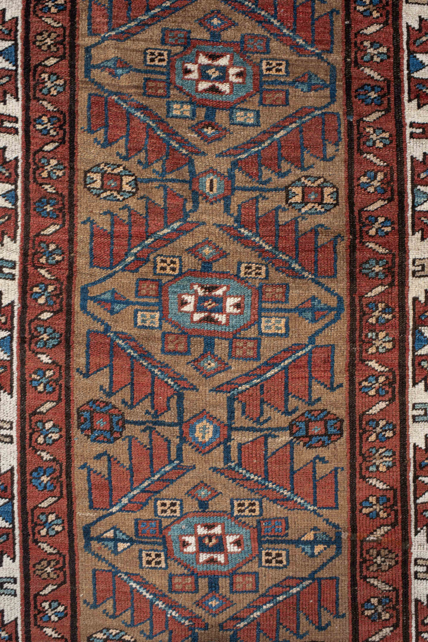 3' x 10' one-of-a-kind handmade vintage NW Persian runner rug. Color palette: camel, rust, ivory, indigo, terra cotta, brown