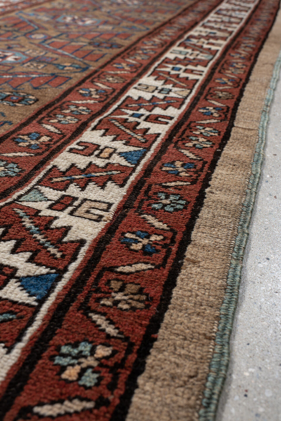 3' x 10' one-of-a-kind handmade vintage NW Persian runner rug. Color palette: camel, rust, ivory, indigo, terra cotta, brown