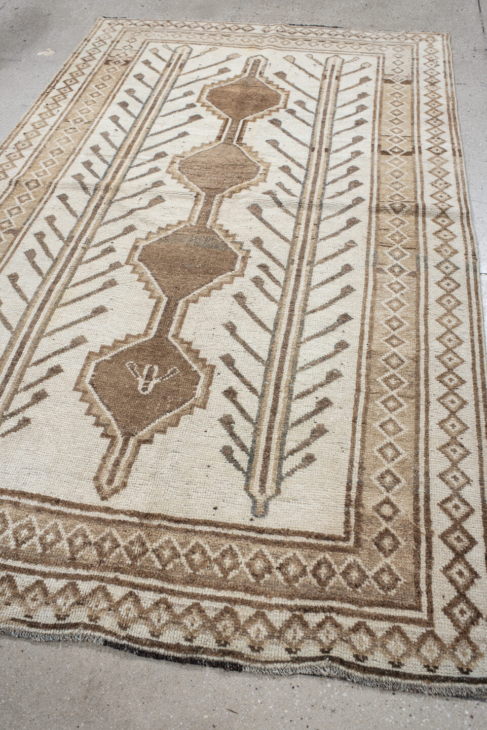 4' x 7' one-of-a-kind handmade vintage Gabbe rug. Color palette: ivory, camel, taupe, brown, beige, gray