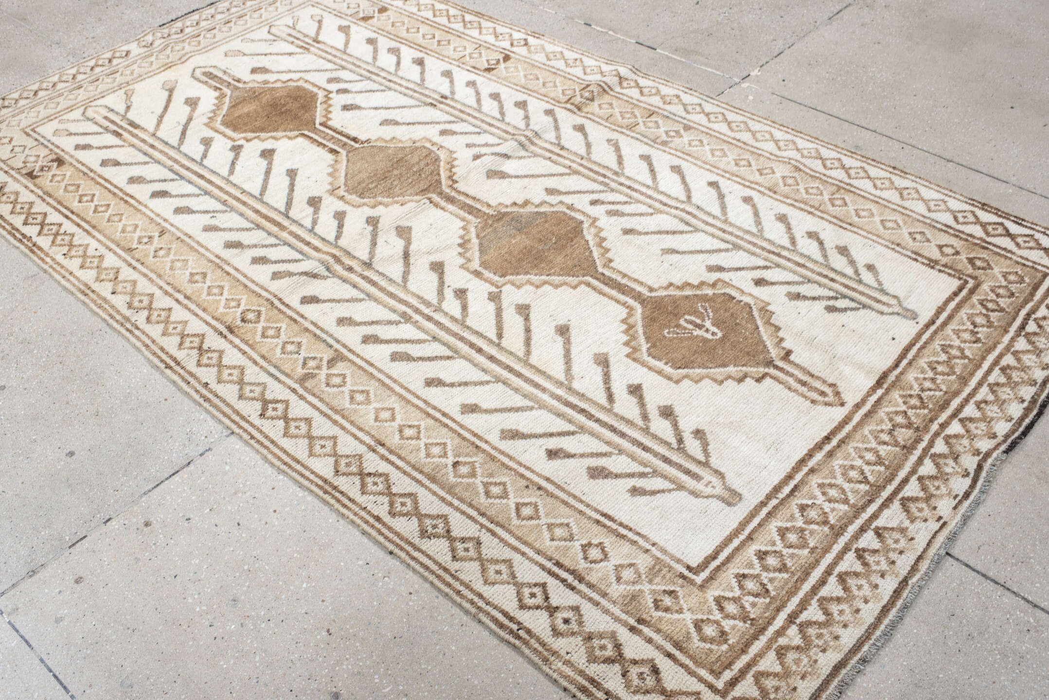 4' x 7' one-of-a-kind handmade vintage Gabbe rug. Color palette: ivory, camel, taupe, brown, beige, gray