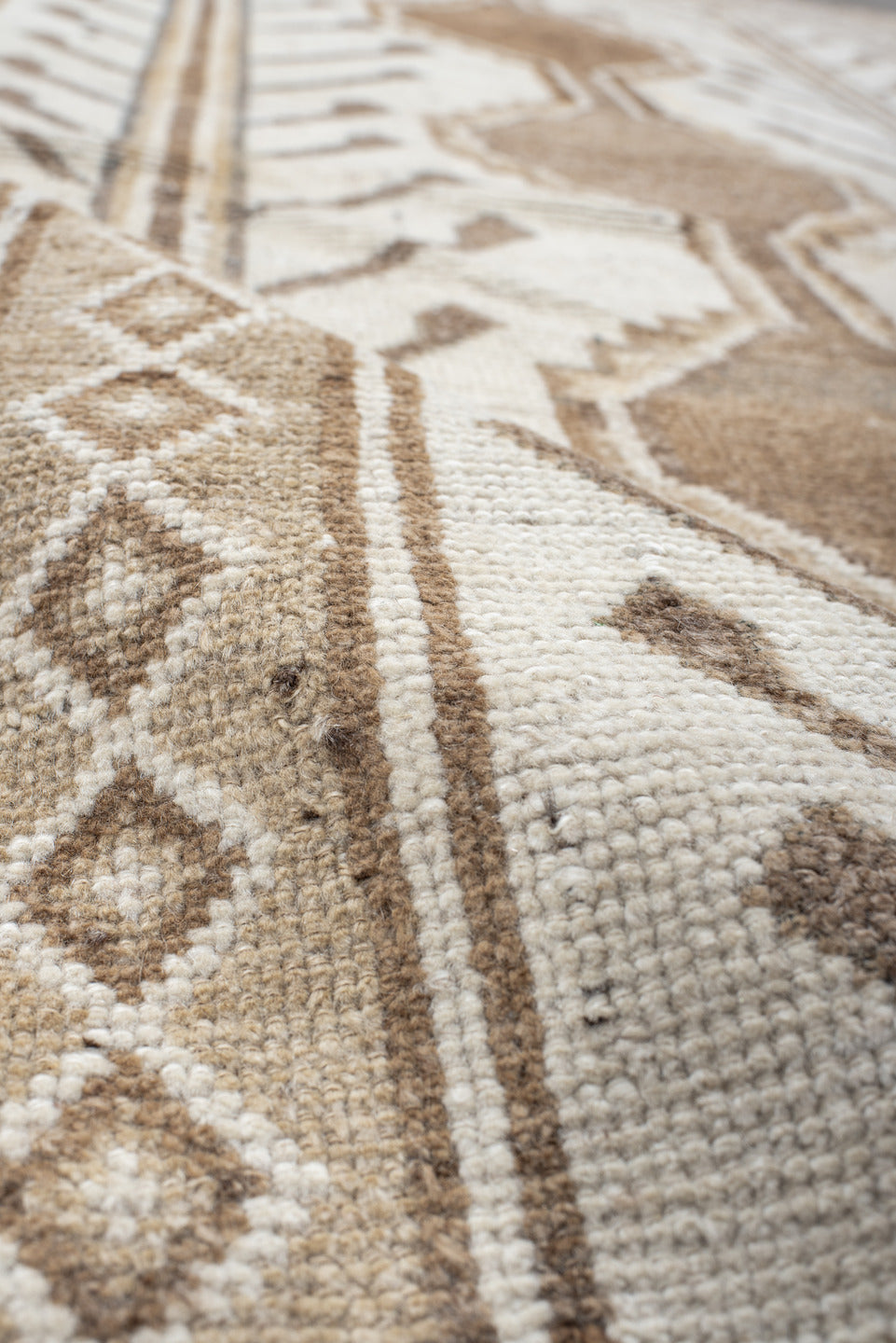 4' x 7' one-of-a-kind handmade vintage Gabbe rug. Color palette: ivory, camel, taupe, brown, beige, gray