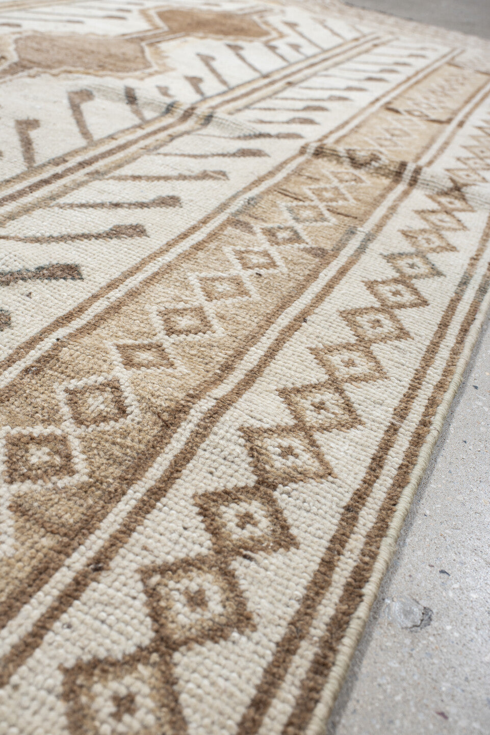 4' x 7' one-of-a-kind handmade vintage Gabbe rug. Color palette: ivory, camel, taupe, brown, beige, gray