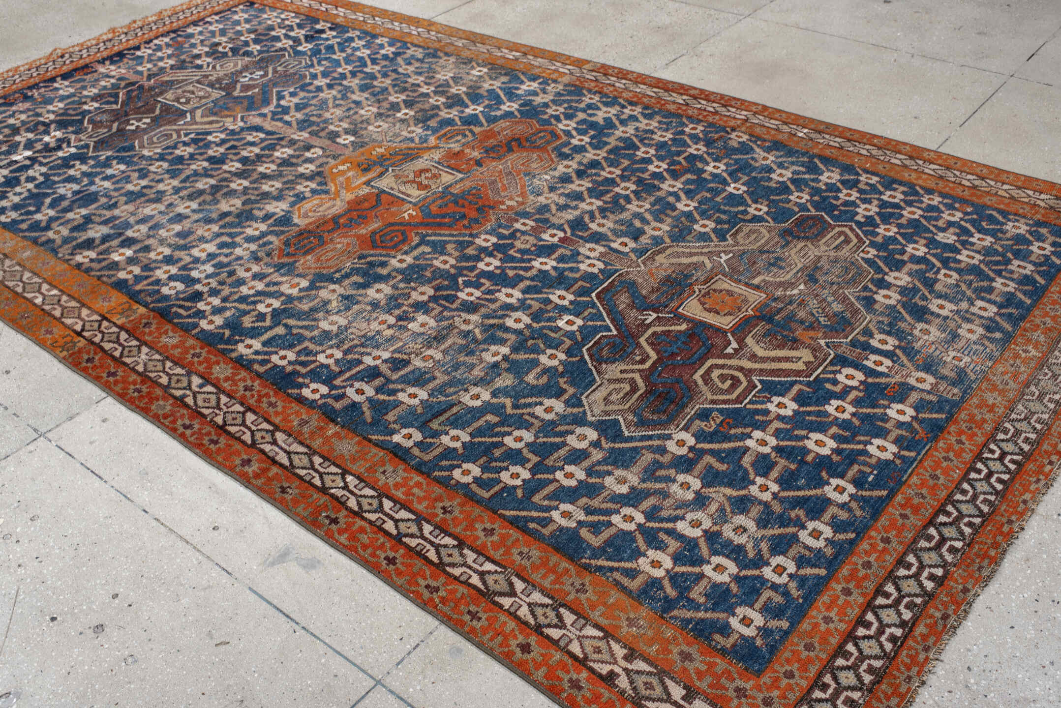 6' x 11' one-of-a-kind handmade vintage Caucasian large size rug. Color palette: blue, rust, ivory, brown, taupe, charcoal
