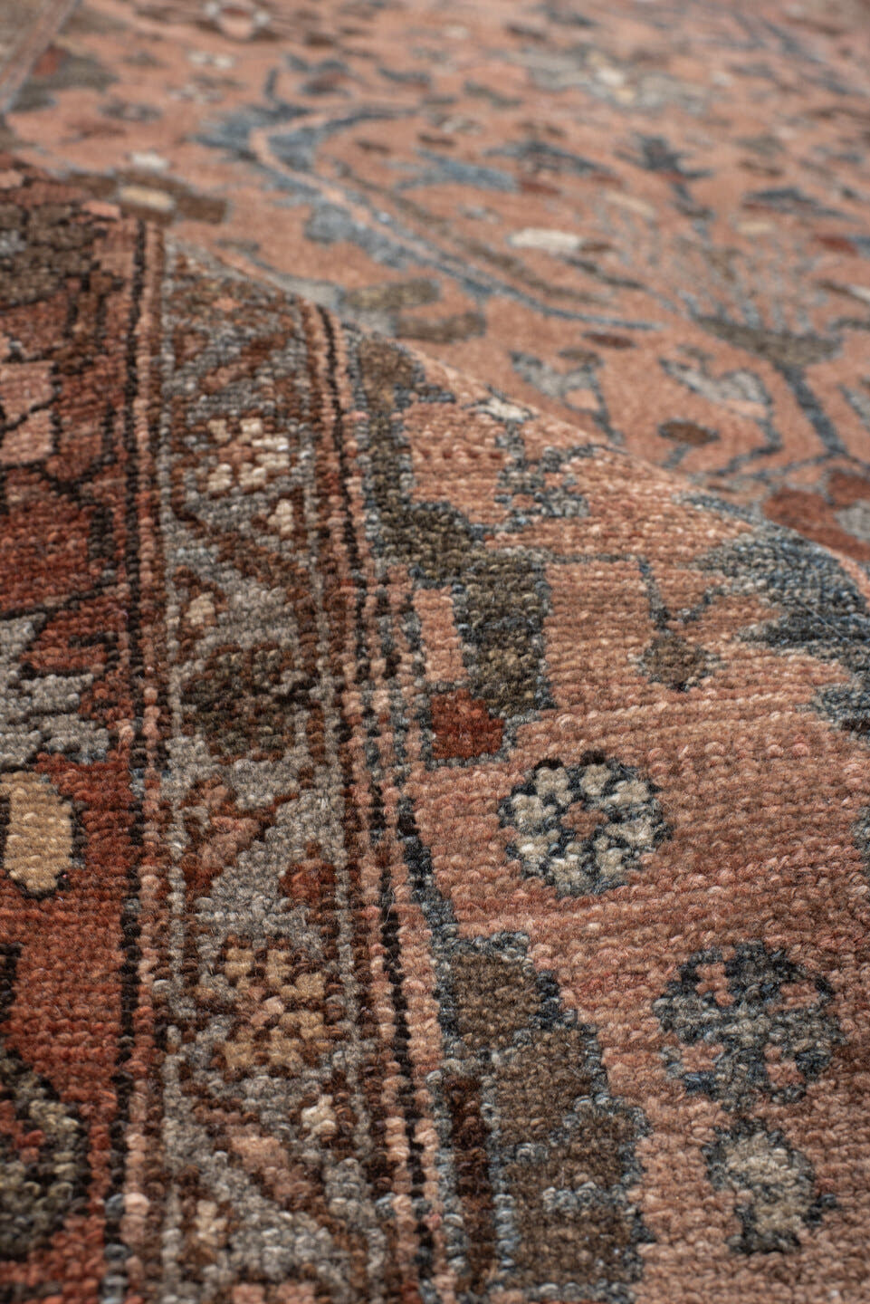 3' x 9' one-of-a-kind handmade vintage Lilian runner rug. Color palette: terra cotta, rust, slate, taupe, brown, ivory