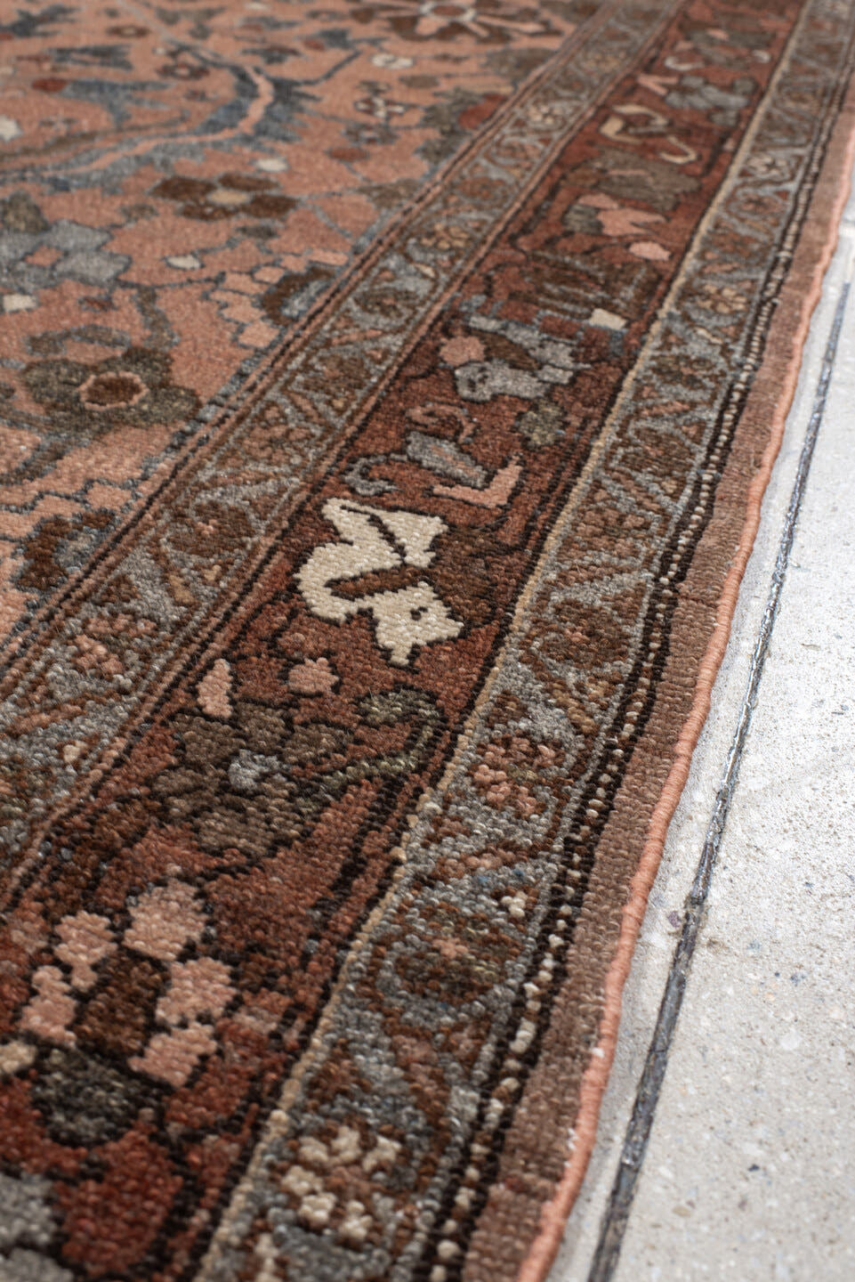 3' x 9' one-of-a-kind handmade vintage Lilian runner rug. Color palette: terra cotta, rust, slate, taupe, brown, ivory
