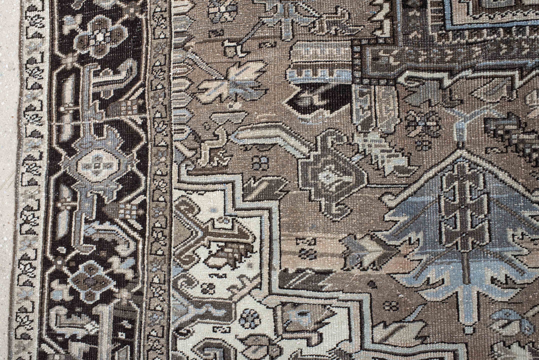 9' x 12' one-of-a-kind handmade antique Heriz large size rug. Color palette: taupe, charcoal, ivory, pale blue, brown, slate