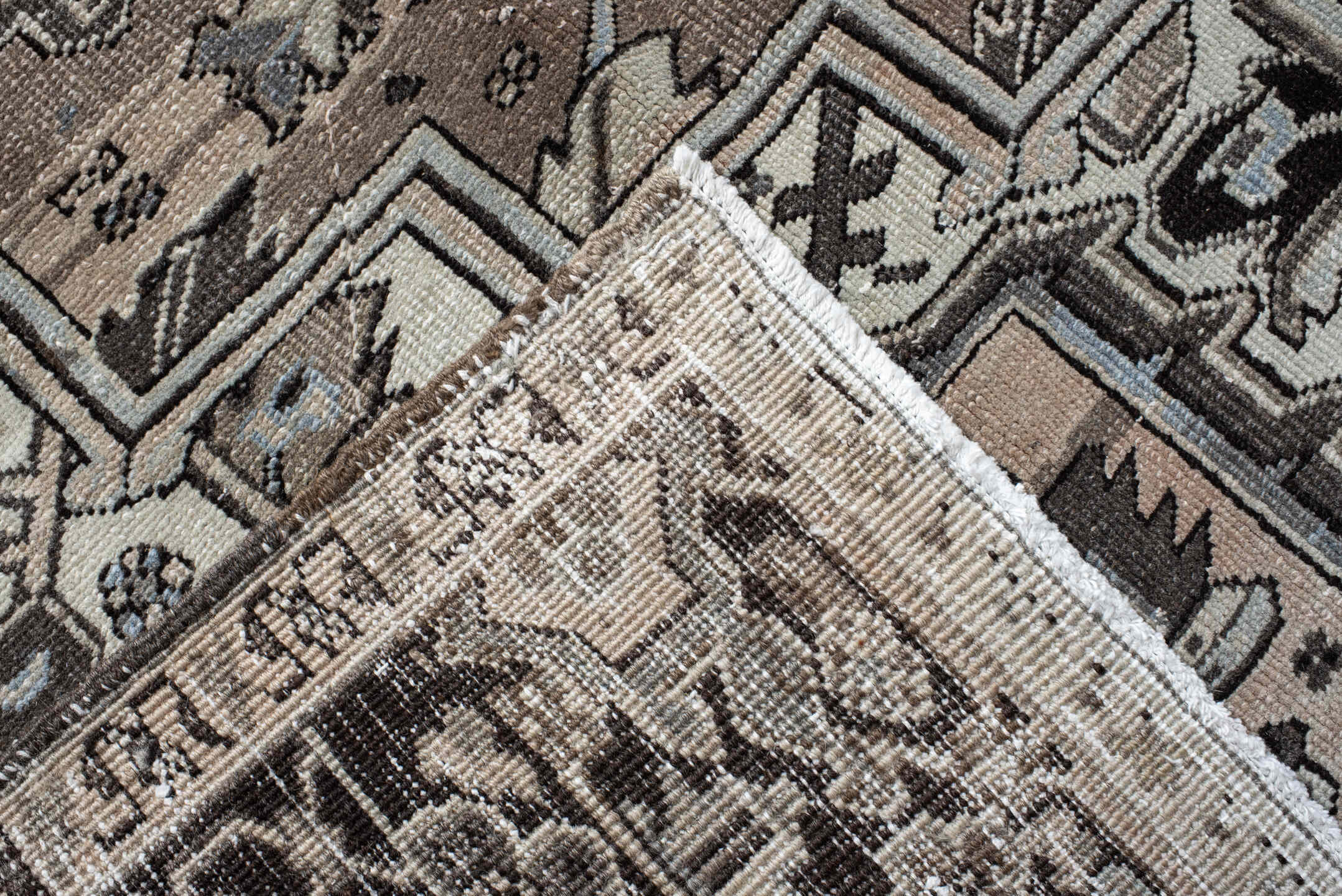 9' x 12' one-of-a-kind handmade antique Heriz large size rug. Color palette: taupe, charcoal, ivory, pale blue, brown, slate