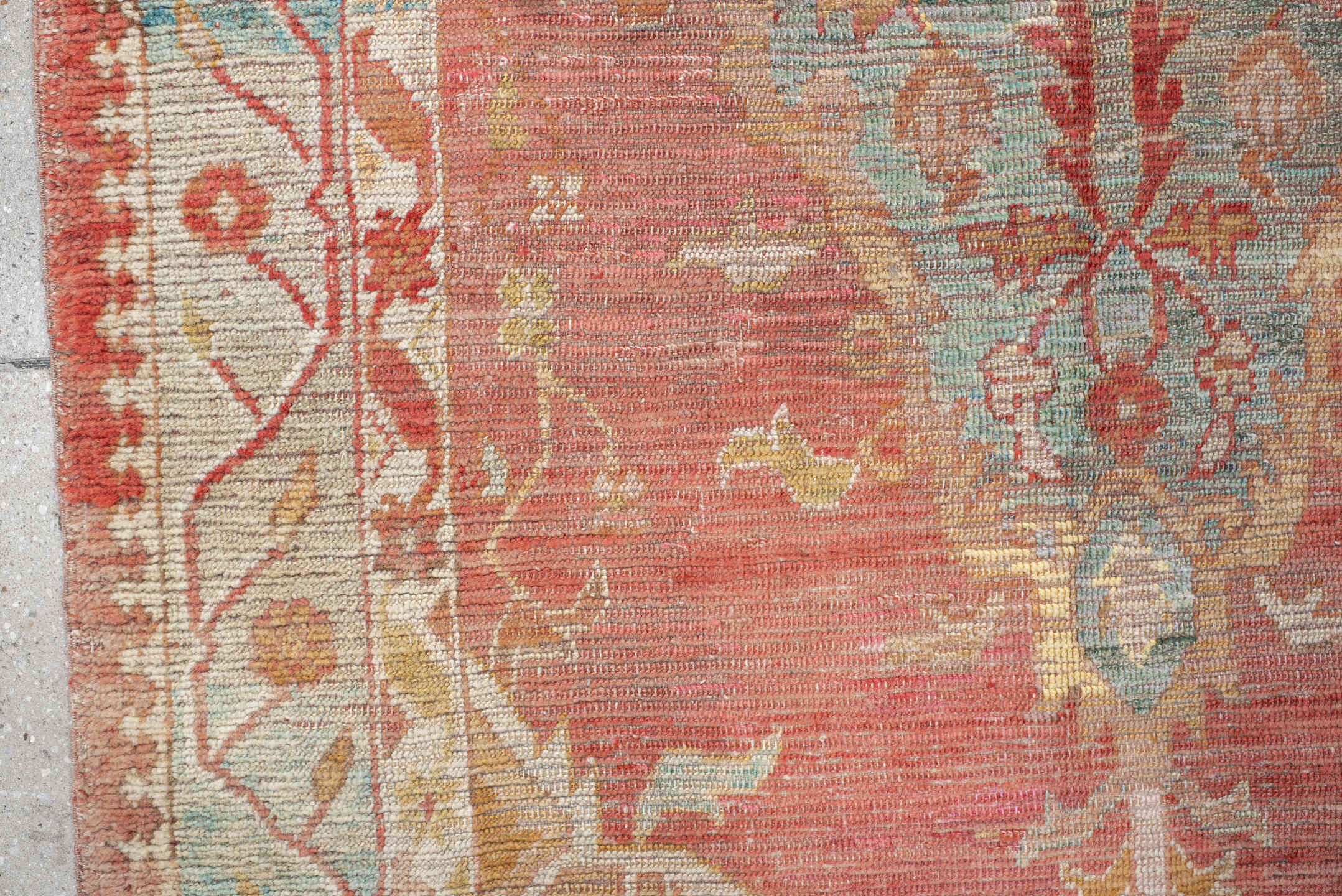 4' x 7' one-of-a-kind handmade vintage Oushak rug. Color palette: rose, aqua, ivory, peach, rust, gold, beige, pink, red