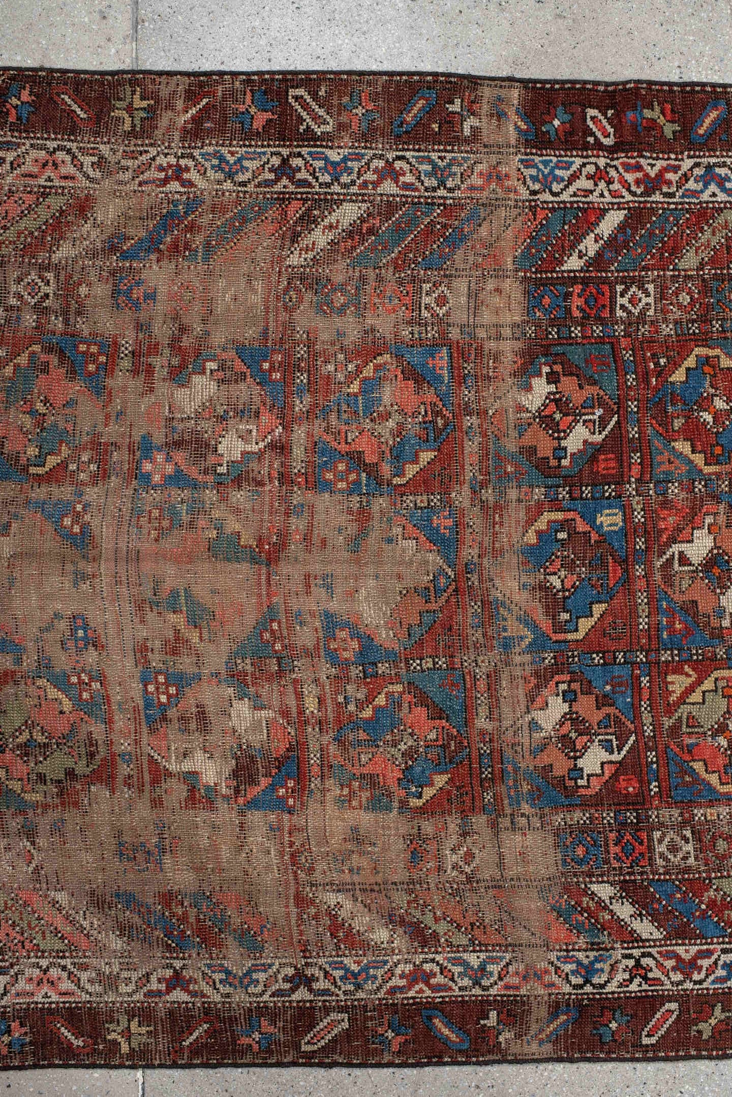 3' x 11' one-of-a-kind handmade antique Varamin runner rug. Color palette: brown, camel, indigo, rust, ivory, terra cotta