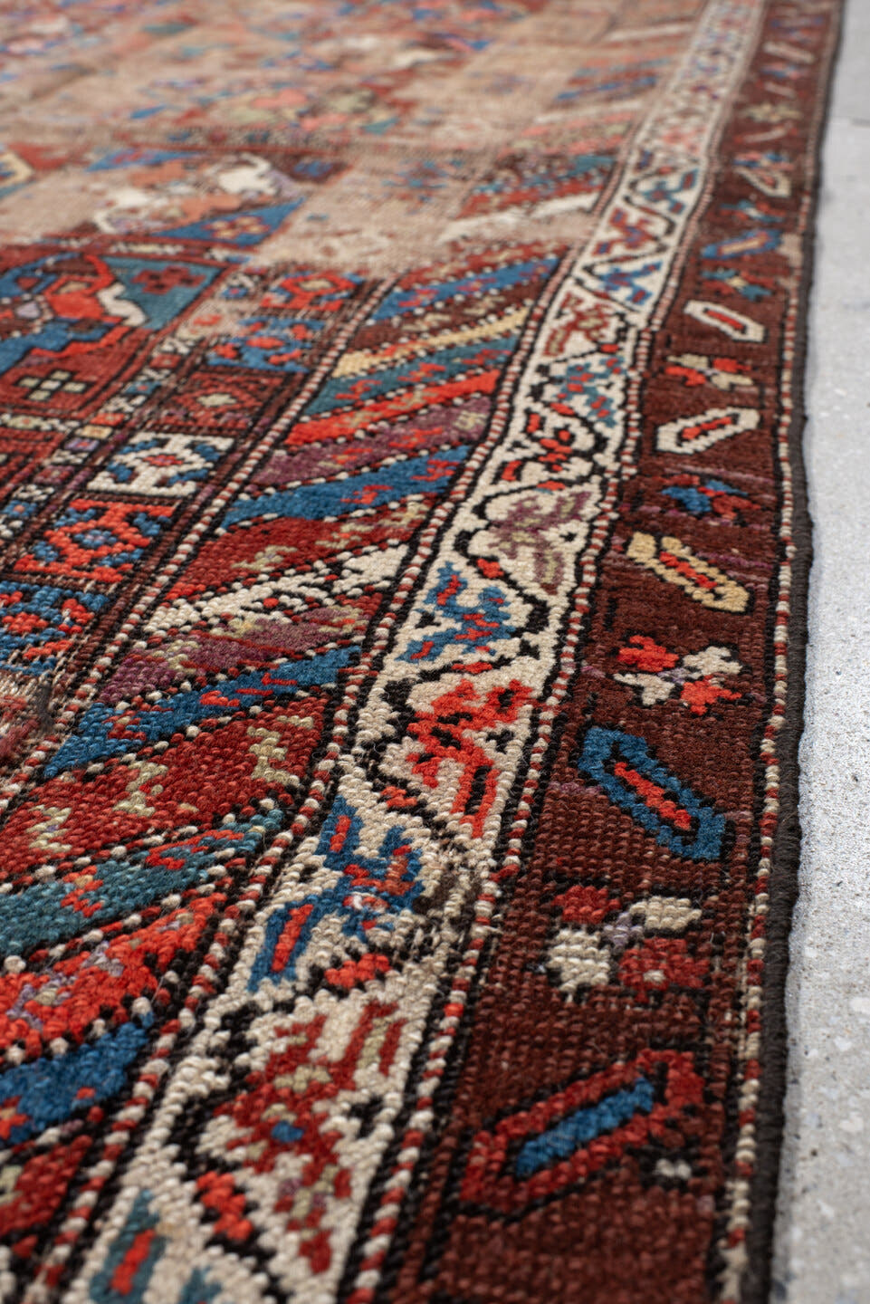 3' x 11' one-of-a-kind handmade antique Varamin runner rug. Color palette: brown, camel, indigo, rust, ivory, terra cotta