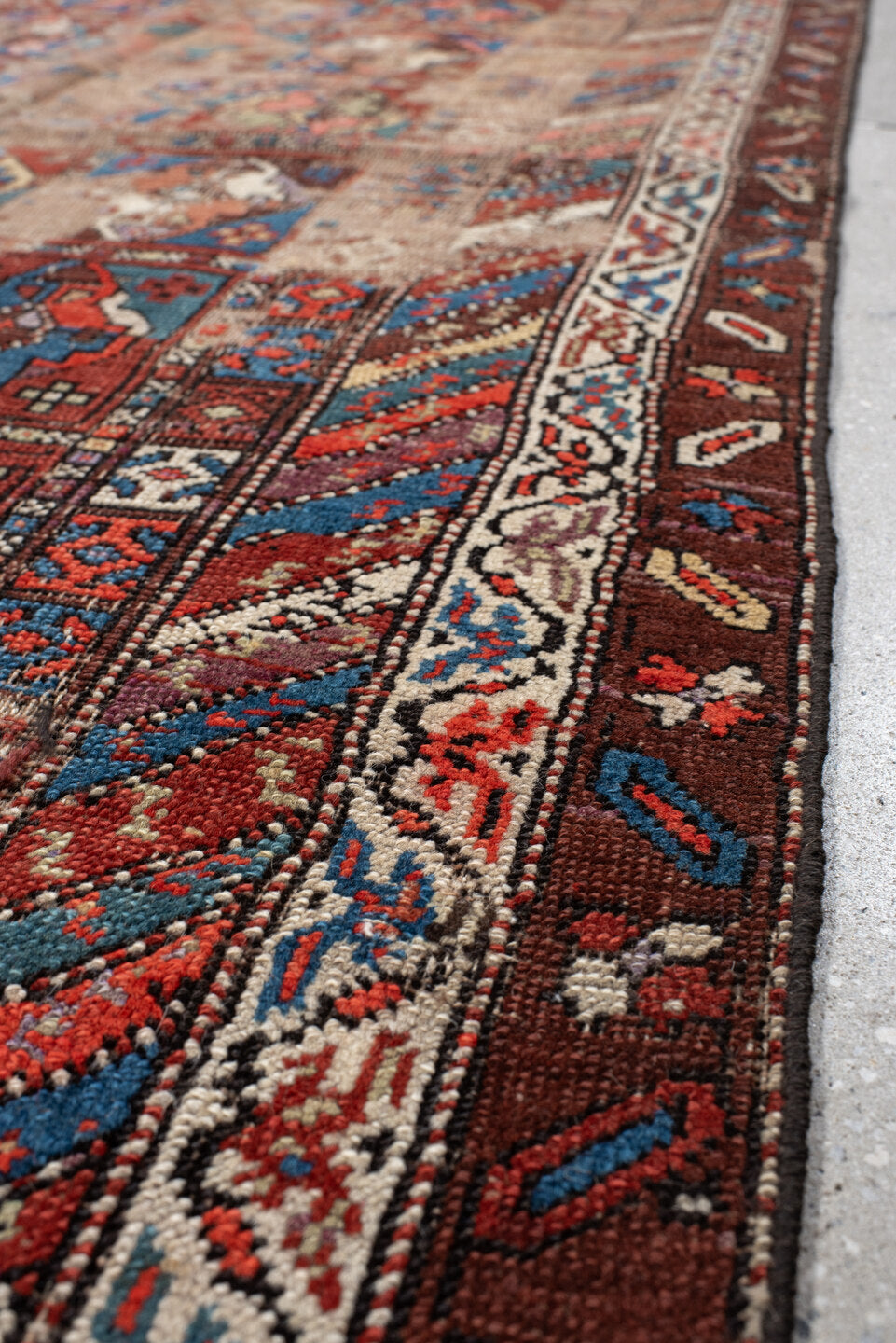 3' x 11' one-of-a-kind handmade antique Varamin runner rug. Color palette: brown, camel, indigo, rust, ivory, terra cotta