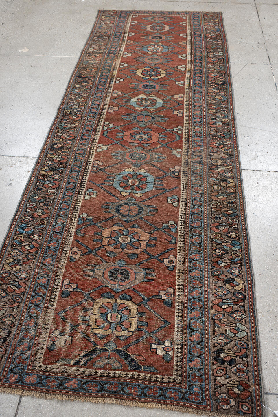 3' x 9' one-of-a-kind handmade vintage NW Persian runner rug. Color palette: rust, blue, ivory, navy, camel, taupe, charcoal