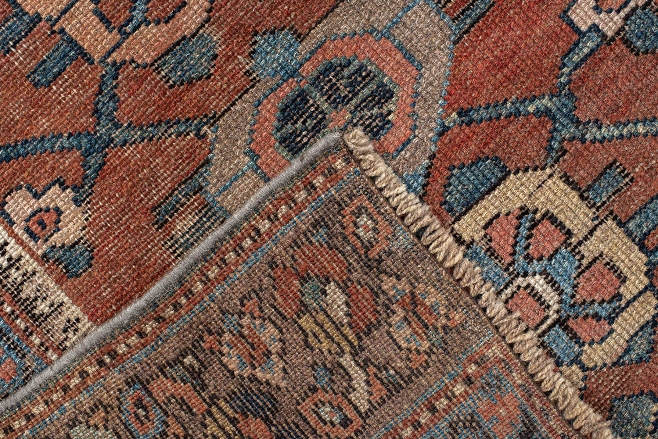 3' x 9' one-of-a-kind handmade vintage NW Persian runner rug. Color palette: rust, blue, ivory, navy, camel, taupe, charcoal