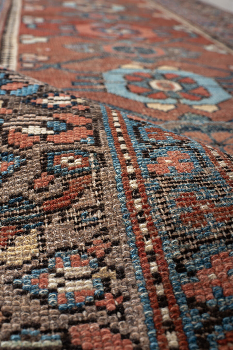 3' x 9' one-of-a-kind handmade vintage NW Persian runner rug. Color palette: rust, blue, ivory, navy, camel, taupe, charcoal