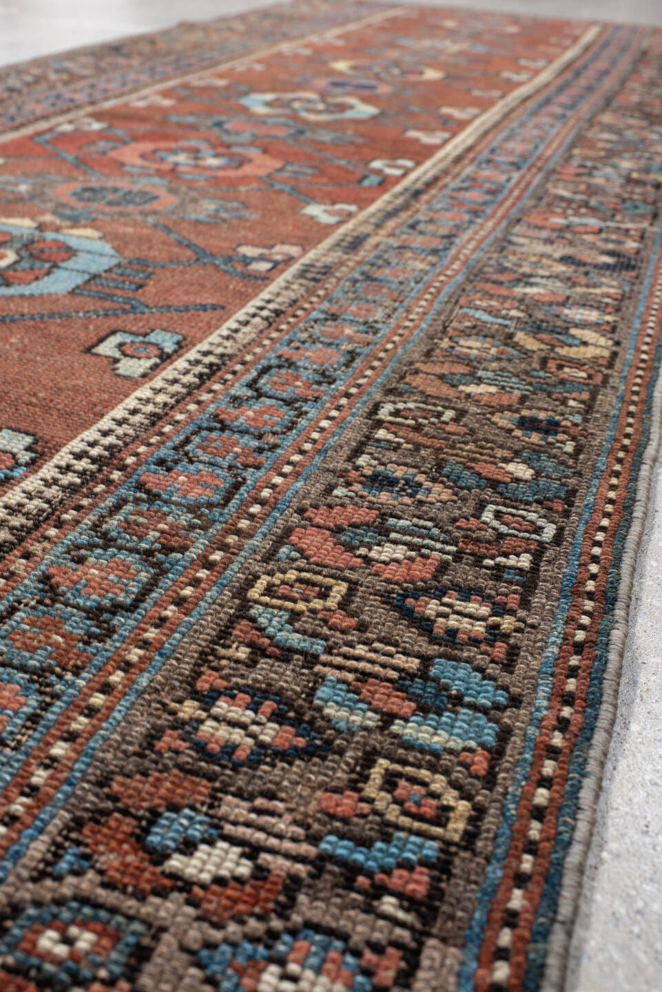 3' x 9' one-of-a-kind handmade vintage NW Persian runner rug. Color palette: rust, blue, ivory, navy, camel, taupe, charcoal