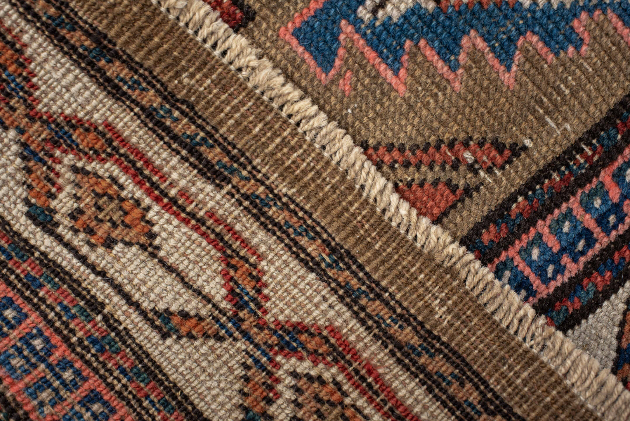 3' x 7' one-of-a-kind handmade vintage Sarab runner rug. Color palette: taupe, camel, indigo, rust, ivory, brown, terracotta