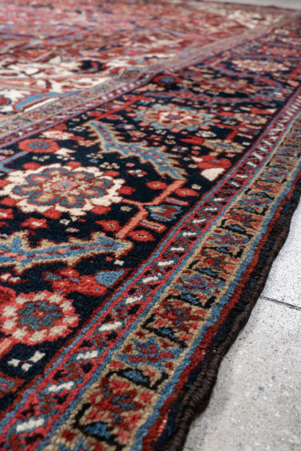 9' x 13' one-of-a-kind handmade antique Heriz large size rug. Color palette: rust, navy, ivory, sky_blue, crimson, camel