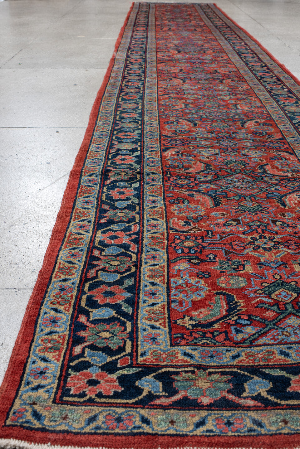 3' x 18' one-of-a-kind handmade vintage Heriz runner rug. Color palette: rust, navy, ivory, sky_blue, coral, camel